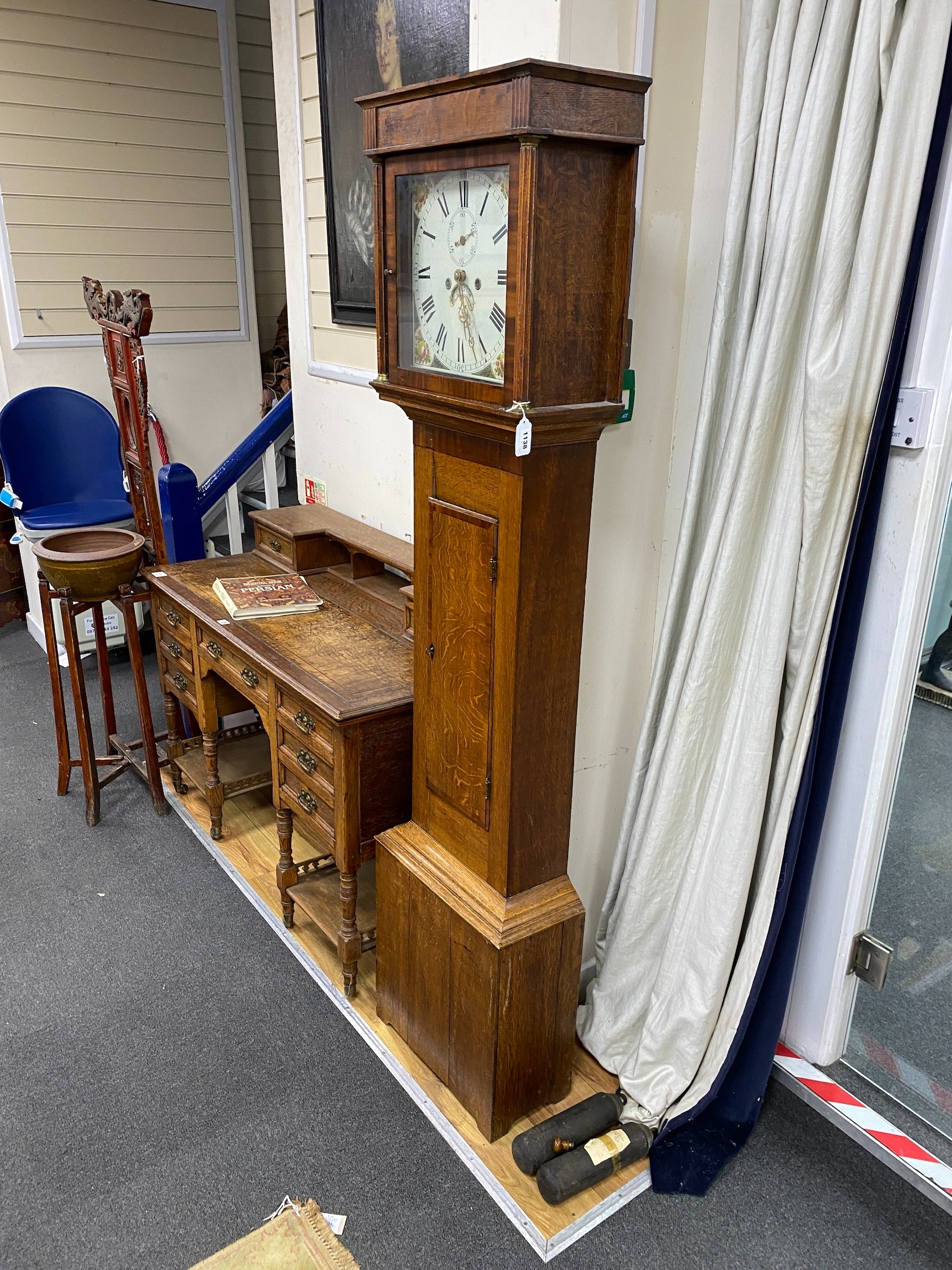 An early 19th century eight day longcase clock with painted dial, height 185cm